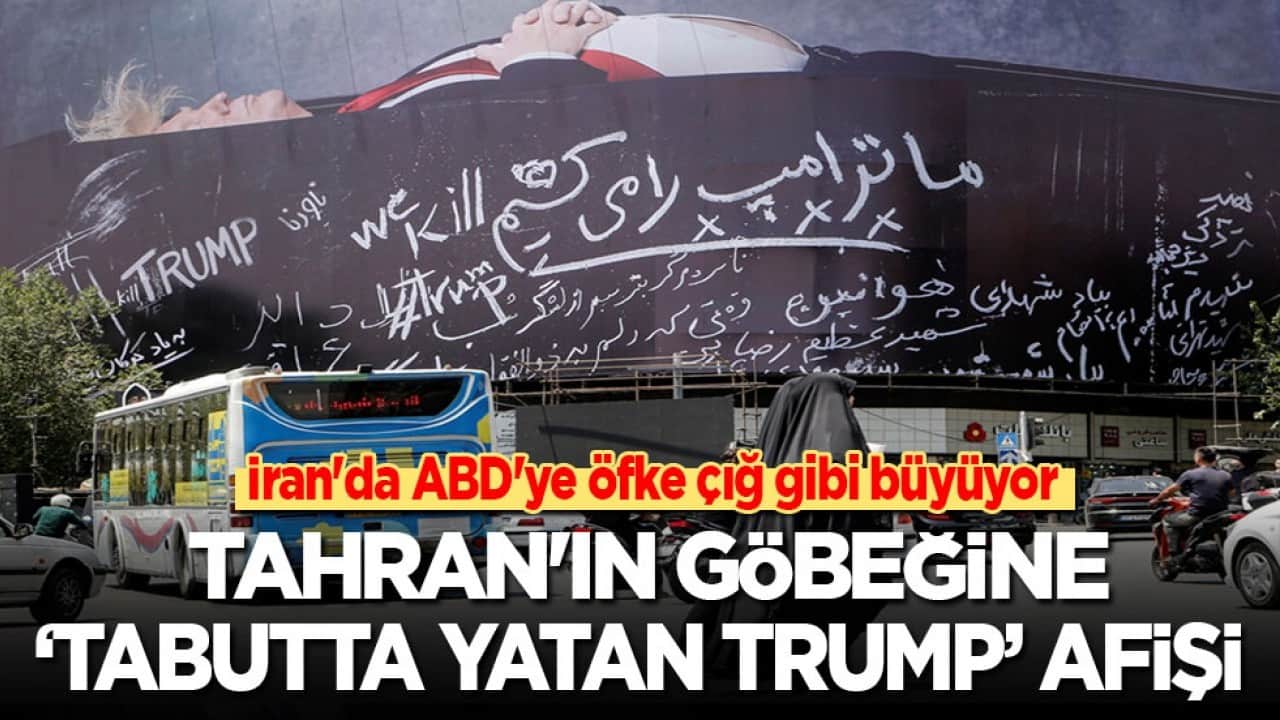 İran'da ABD'ye öfke çığ gibi büyüyor: Tahran'ın göbeğine 'tabutta yatan Trump' afişi 