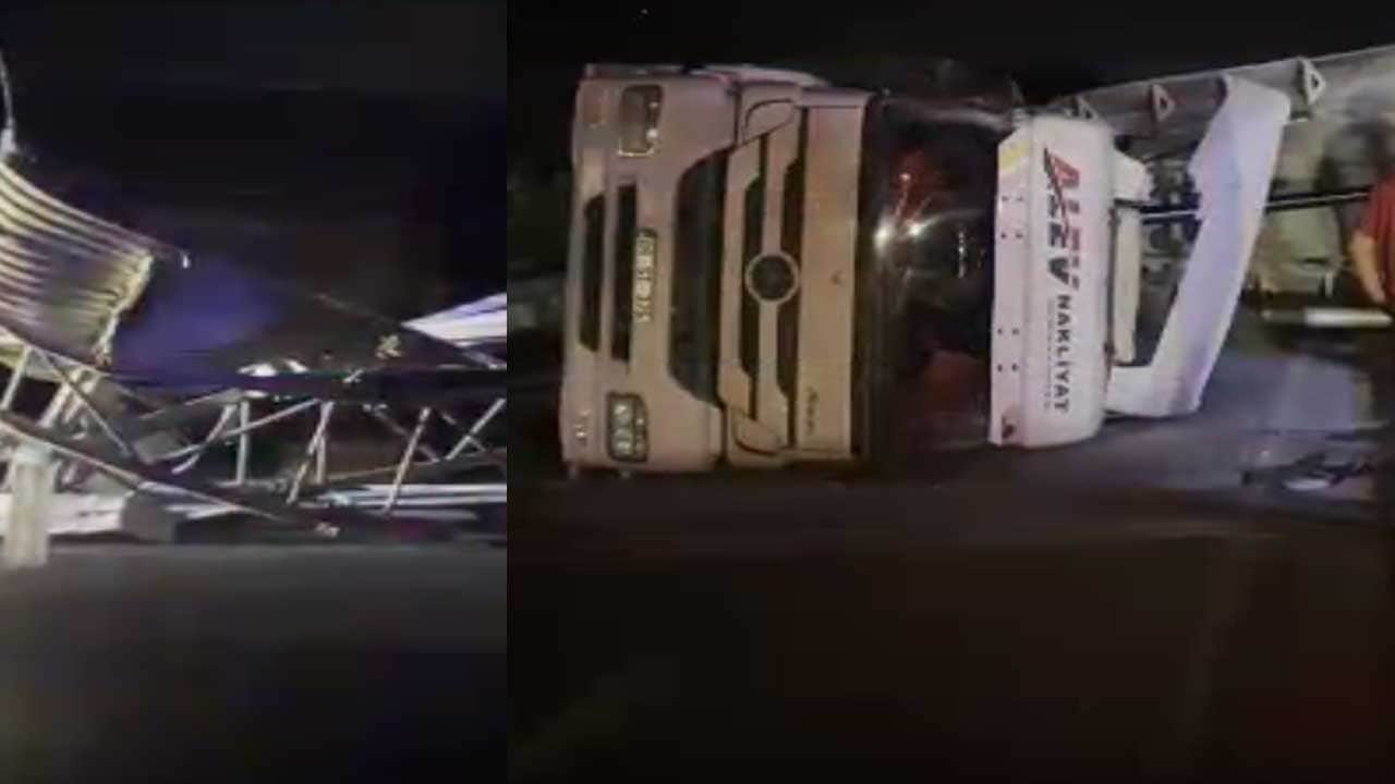 Damperi açık kalan TIR tabelaya çarpıp devrildi
