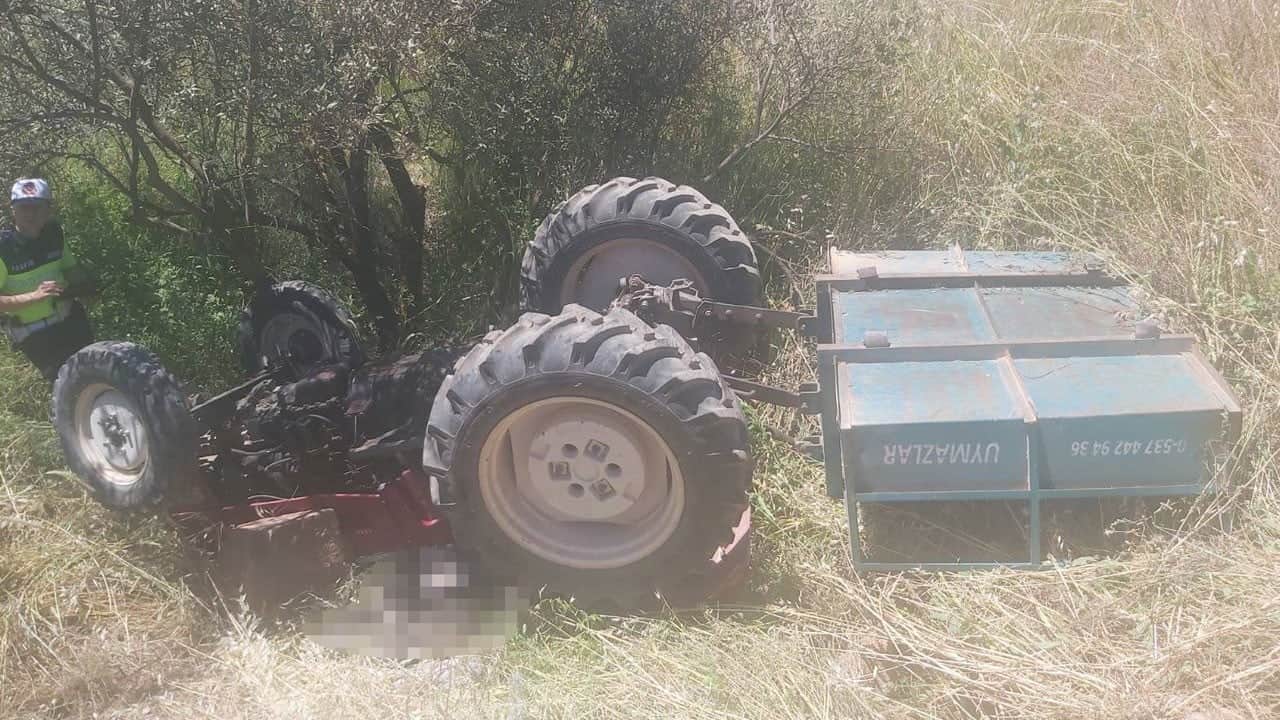 Zeytinliğe uçan traktörün altında can verdi