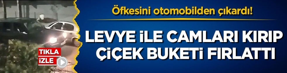 Öfkesini otomobilden çıkardı! Levye ile camları kırıp çiçek buketi fırlattı