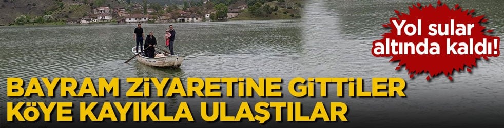 Yol sular altında kaldı! Bayram ziyaretine gittiler, köye kayıkla ulaştılar