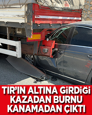 Tırın altına girdiği kazadan burnu kanamadan çıktı
