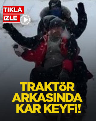 Traktör arkasında kar keyfi!