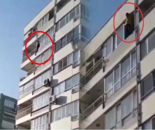 9. kattan aşağı atlayan adam yürekleri hoplattı!