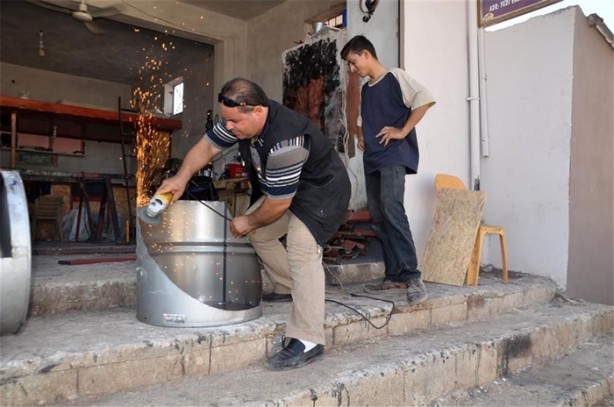 Foto - Boş varilleri öyle bir değerlendirdi ki!