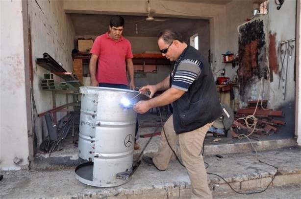 Foto - Boş varilleri öyle bir değerlendirdi ki!