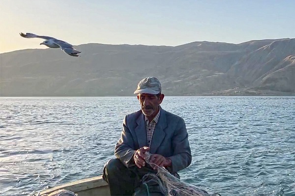 Foto - Denizsiz kentin balıkçı çifti