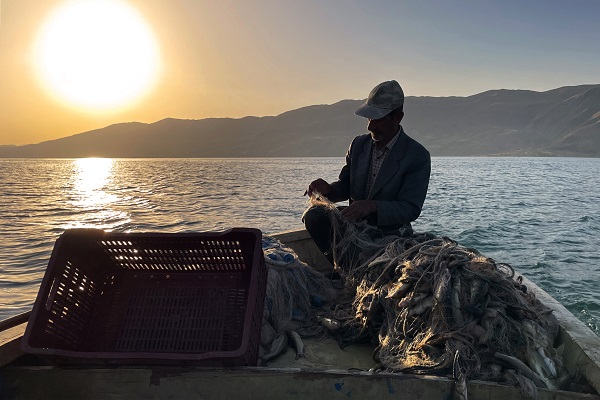 Foto - Denizsiz kentin balıkçı çifti