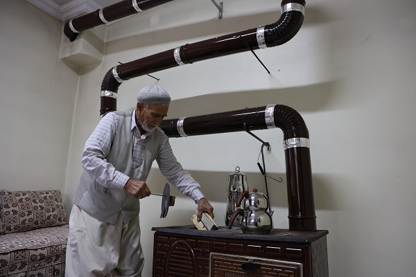 Foto - Eşi üşümesin diye adeta sanat yaptı! 