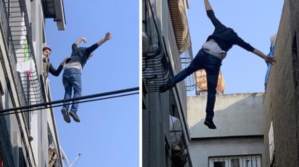 Eşine kızıp damdan atladı, komşusunun üzerine düştü!