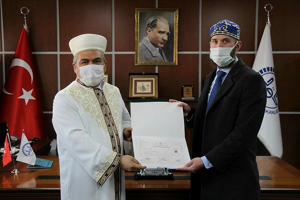 Foto - Ezan sesinden etkilenen anne ve oğlu Müslüman oldu