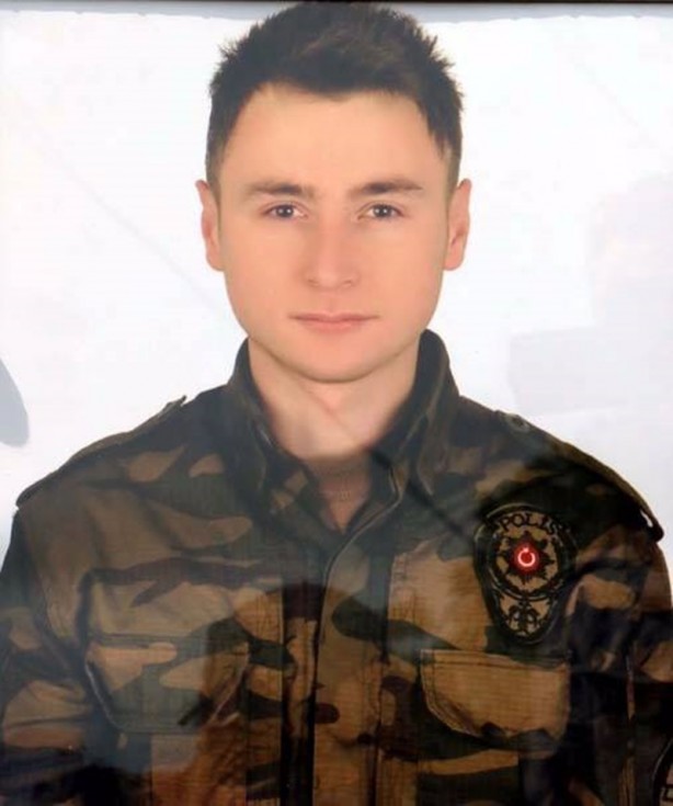 Foto - Özel harekat polisinin kolundaki ayet