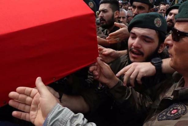 Foto - Özel harekat polisinin kolundaki ayet