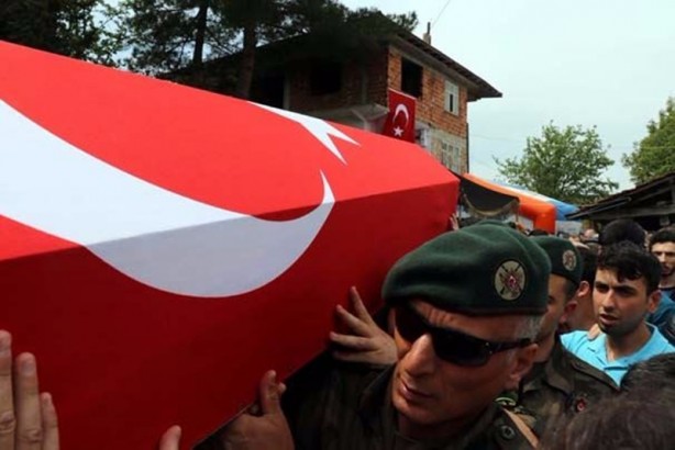 Foto - Özel harekat polisinin kolundaki ayet