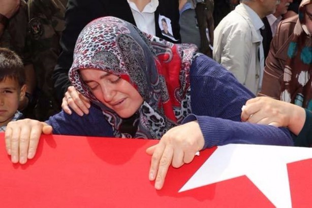 Foto - Özel harekat polisinin kolundaki ayet