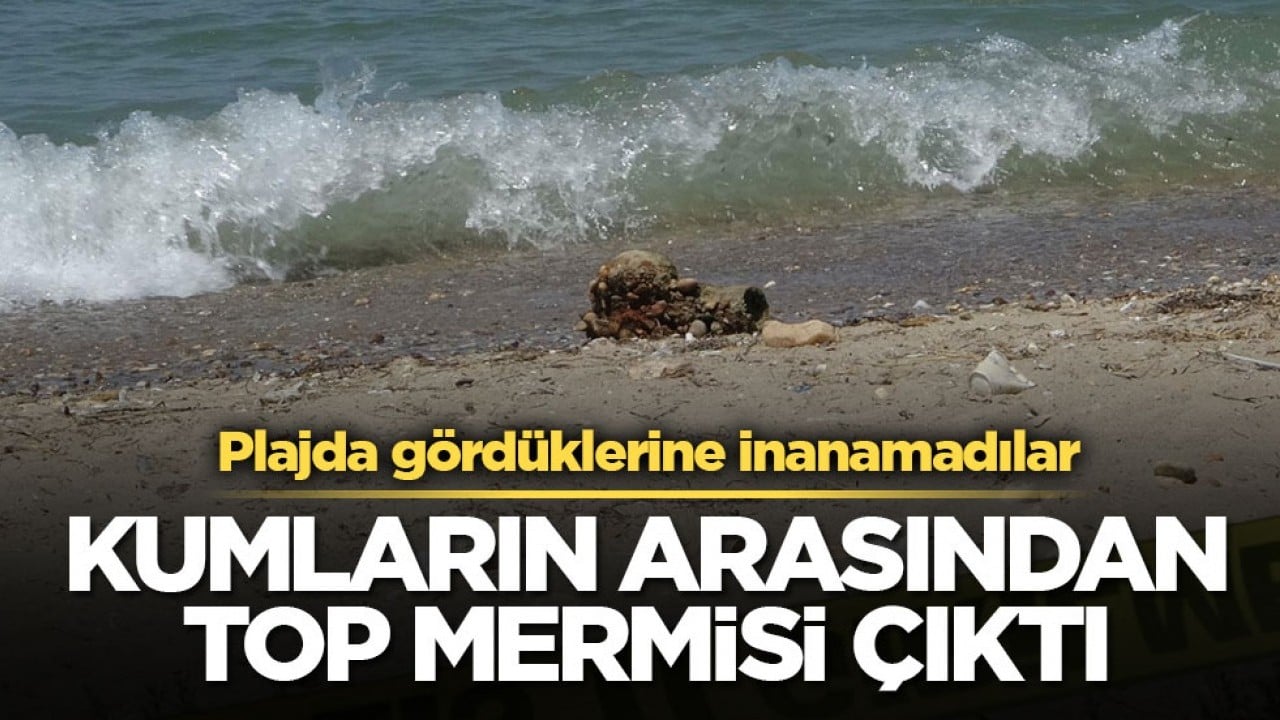 Plajda gördüklerine inanamadılar! Kumların arasından top mermisi çıktı