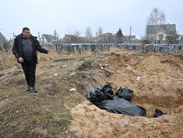 Foto - Rus ordusunun geri çekildiği bölgelerde korkunç görüntüler kaydedildi!