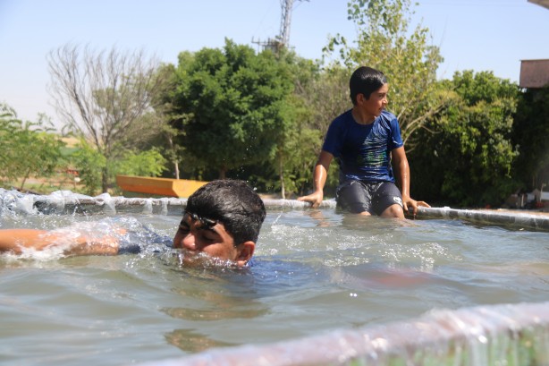 Foto - Sıcaktan bunalan çocukları için bakın ne yaptı!