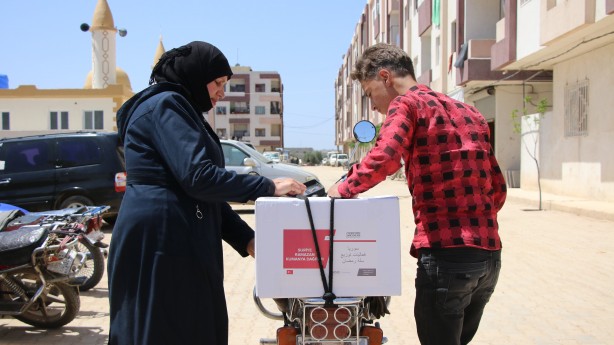 Foto - Suriye'de 700 aileye gıda yardımı