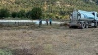 Balıkesir'de Nergis Çayı göleti yangın helikopterlerinin su ikmal noktası oldu
