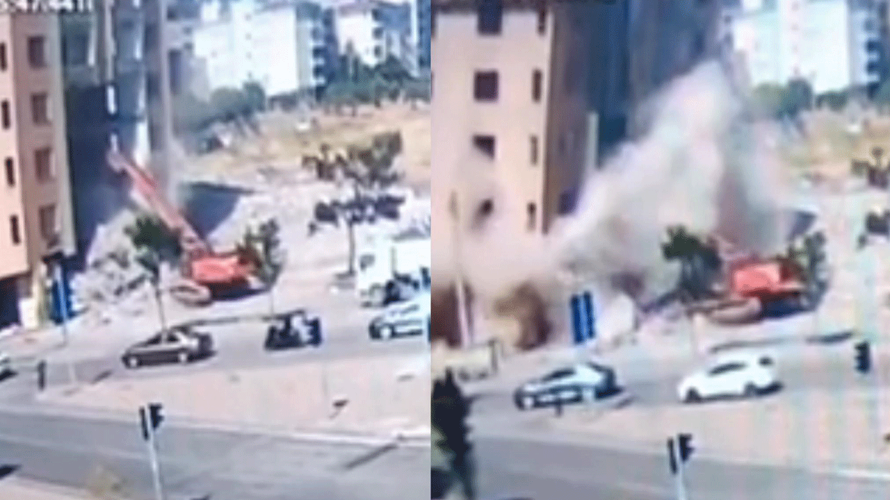 Ağır hasarlı bina iş makinesinin üzerine böyle yıkıldı