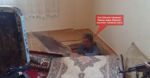 ‘Adam öldürmekten’ aranan şahıs gizli bölmede yakalandı