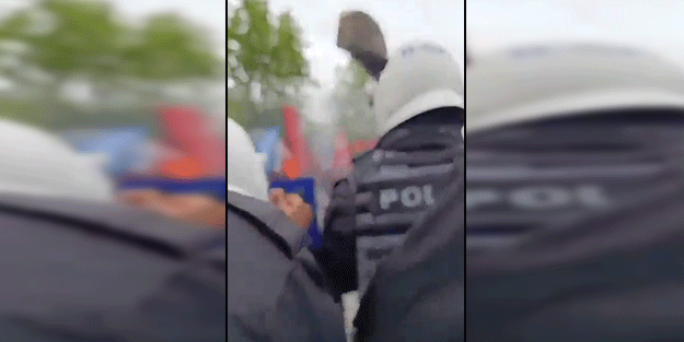 1 Mayıs provokatörlerinin fırlattığı kaldırım taşının polisimize isabet anı kamerada!