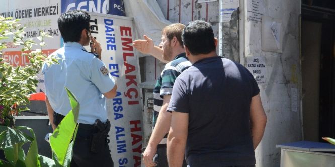 İşyeri tabelası belediye personelinin başına düştü