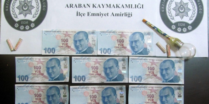 Paspasın altında sahte para, farda ise uyuşturucu aparatı ele geçirildi