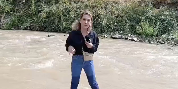 Gazetecinin bulunduğu dereye girerek haber yapması tepki çekti