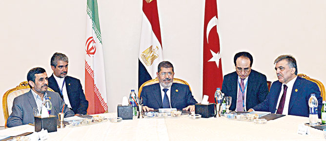 Gül-Ahmedinejad-Mursi 3’lü zirvesi