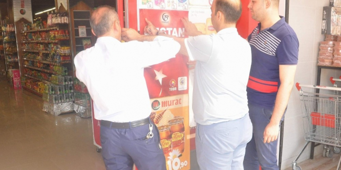 Siirt TSO esnafa afiş dağıttı