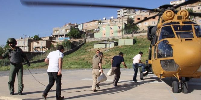 Oy torbaları helikopterle taşındı