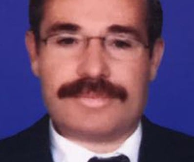 Emekli öğretmenin cesedini çıkarmak için maske taktılar
