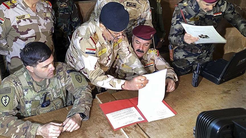 ABD askerlerinin çekildiği Irak'taki Kaim Üssü'nde devir teslim töreni düzenlendi