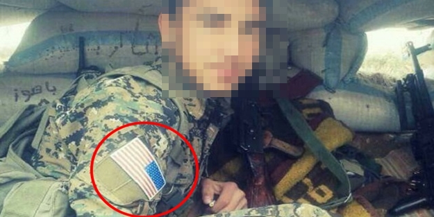 ABD bayrağı PKK/PYD'li teröristin kolunda!