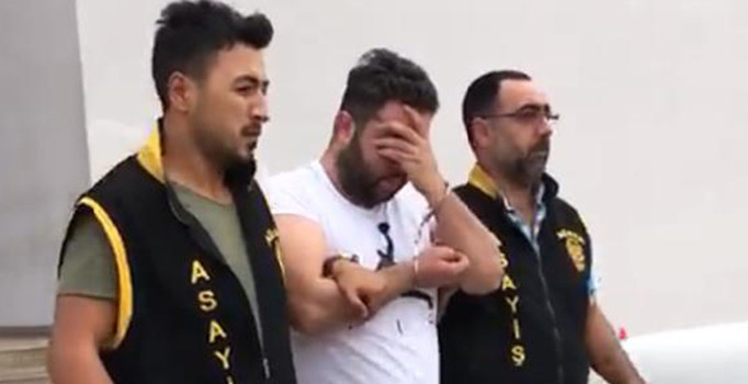 Adana'da 21 yıl hapis cezasıyla aranan internet dolandırıcısı yakalandı