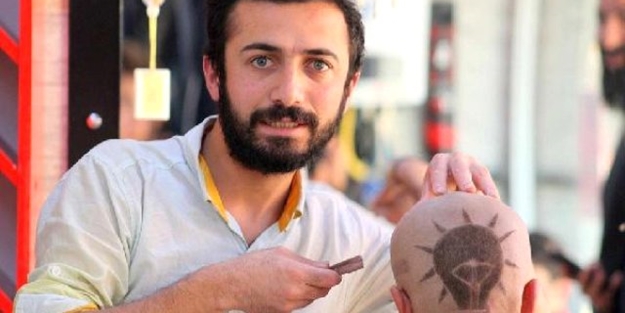 AK Parti'nin amblemini kafasına kazıttı