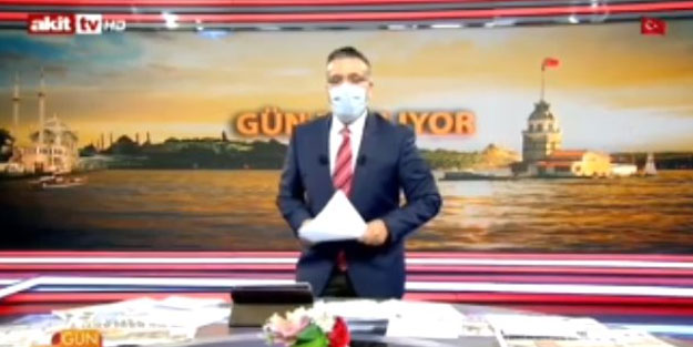 Akit TV spikeri haberleri maskeyle sundu