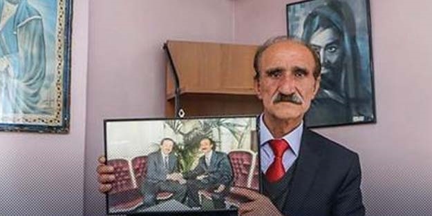 Erdoğan'ın fotoğrafını kaldırmadığı için saldırıya uğradı