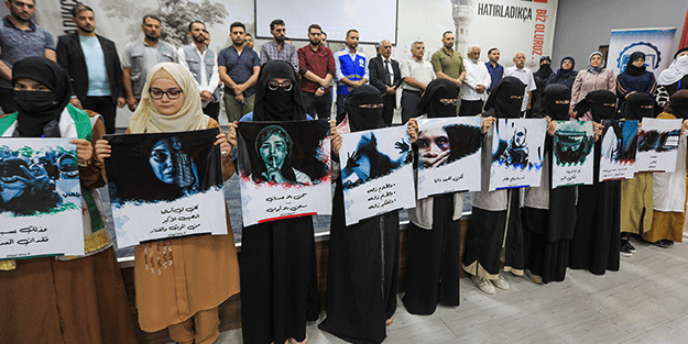 Alıkonulan kadınlar Esed'in zindanlarında yaşadıklarını resmetti