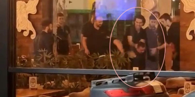 Alkollü girdiği kafede kadına zorluk çıkarınca yaka paça dışarı atıldı