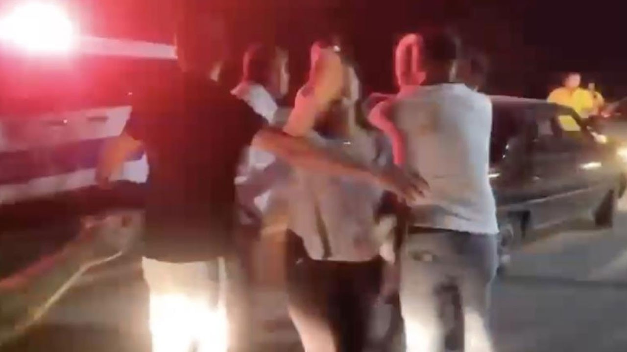 Alkollü sürücünün kızı gazeteciye saldırdı