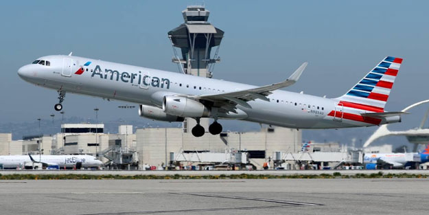 Amerikan Havayolları'ndan insanlık dışı uygulama! Yolcudan Filistin yazılı kazağı çıkarması istendi