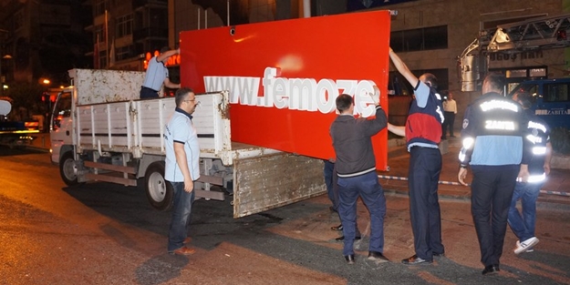 FEM Dershanesi'nin izinsiz taktığı tabelalar söküldü