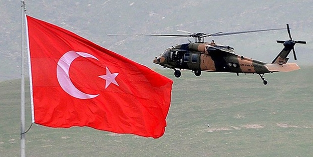 Askeri helikoptere ateş açıldı