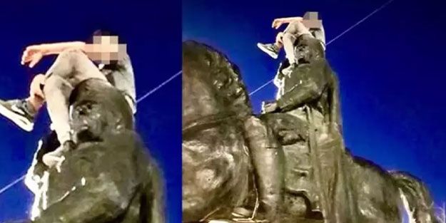 Atatürk heykelinin üzerine çıktı! Valilik açıklama yaptı