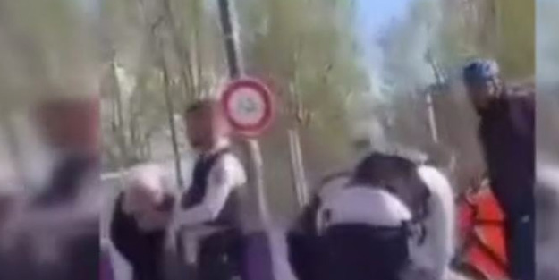 Görüntüler infiale neden oldu! Avrupa'nın göbeğinde başörtülüleri tekme tokat dövdüler