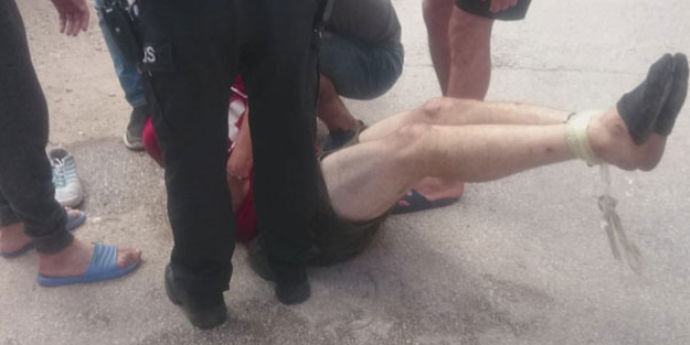 Ayakları bağlı Cezayirli şahıs, polisi harekete geçirdi