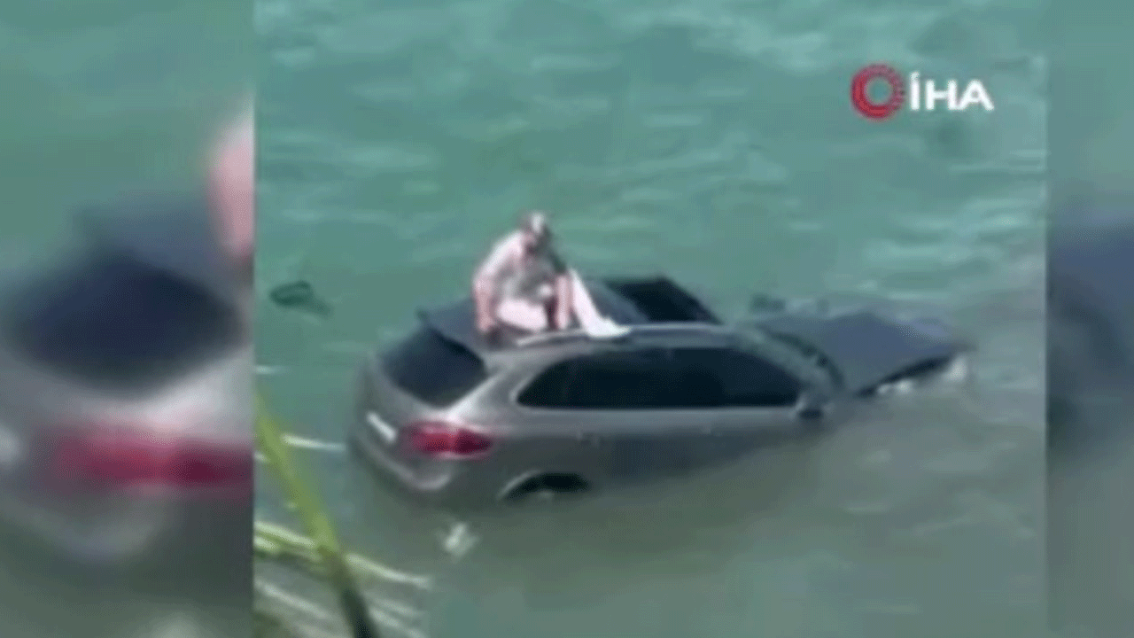 Ayvalık'ta otomobil denize uçtu! Böyle yardım bekledi!